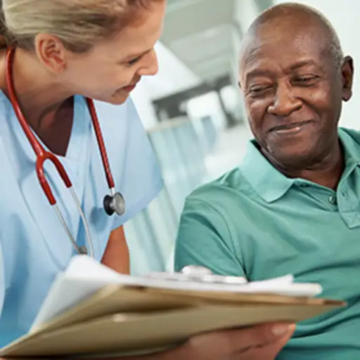 Nurse giving a patient good news.