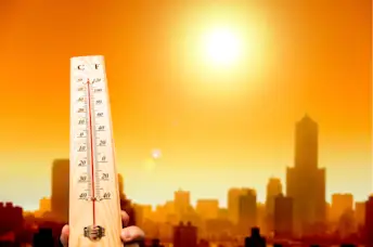 Thermometer rising under the hot sun.
