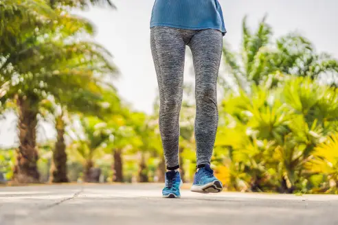 Girl leggings standing rear view hi-res stock photography and