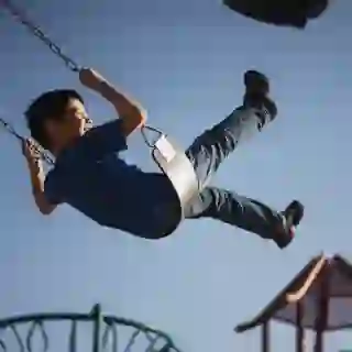 child on swings