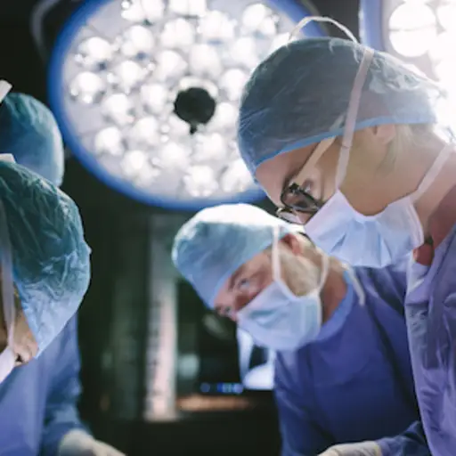 Surgeon concentrating during surgery.