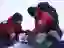 paramedics apply neck brace to injured skier