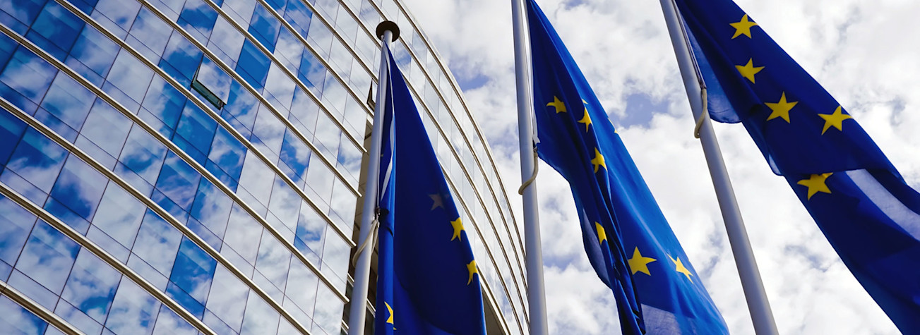 EU flags in front of the European Commission building