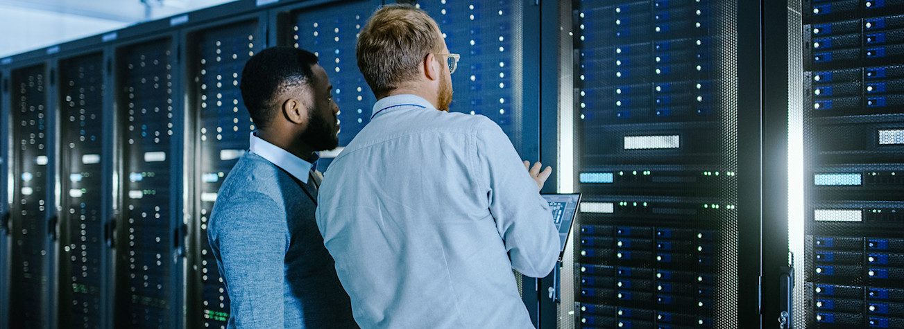 2 men in a data center