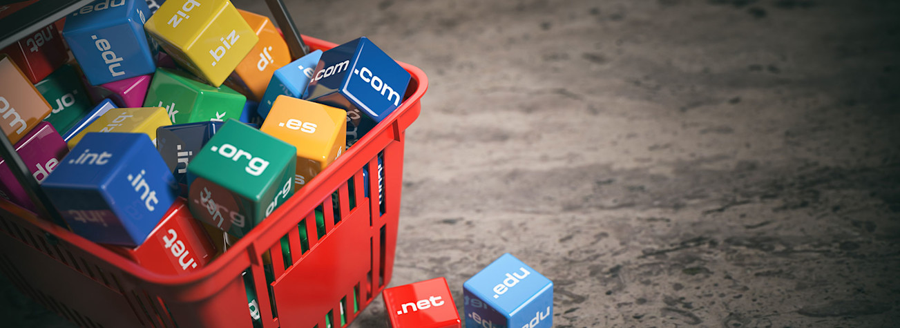 Blocks with different internet extensions in a shopping basket