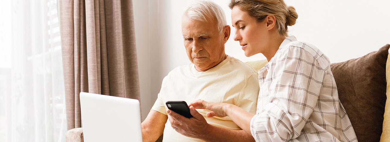 Father and daughter log in at a healthcare website