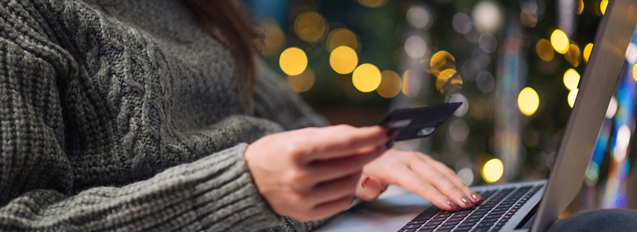 Woman doing Christmas shopping online