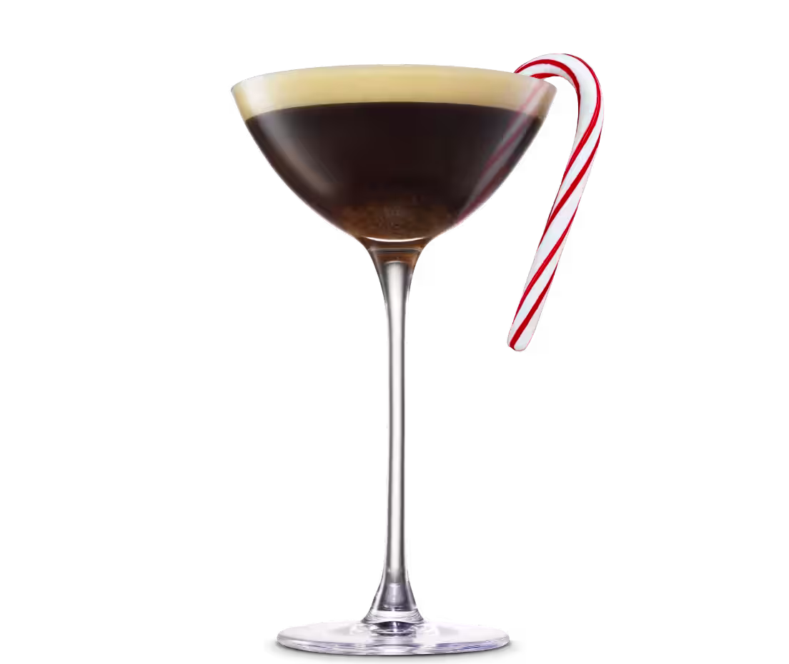 An Espresso Mint-Tini cocktail with mint and a candy cane garnish