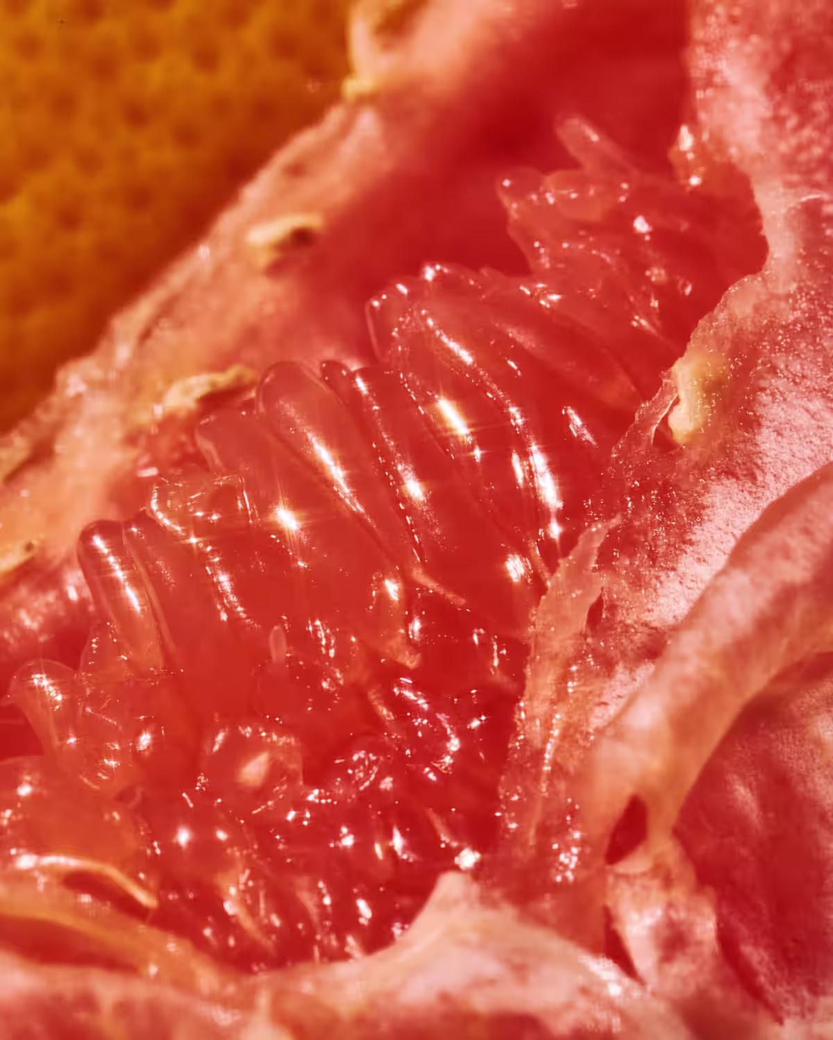 A close up of a grapefruit wedge