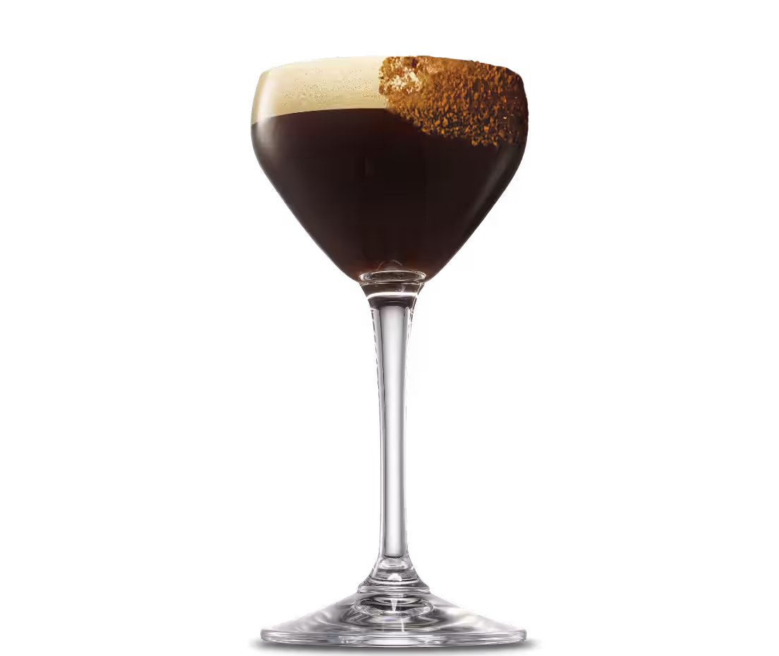 A Gingerbread Espresso Martini Cocktail with a gingerbread crumb garnish