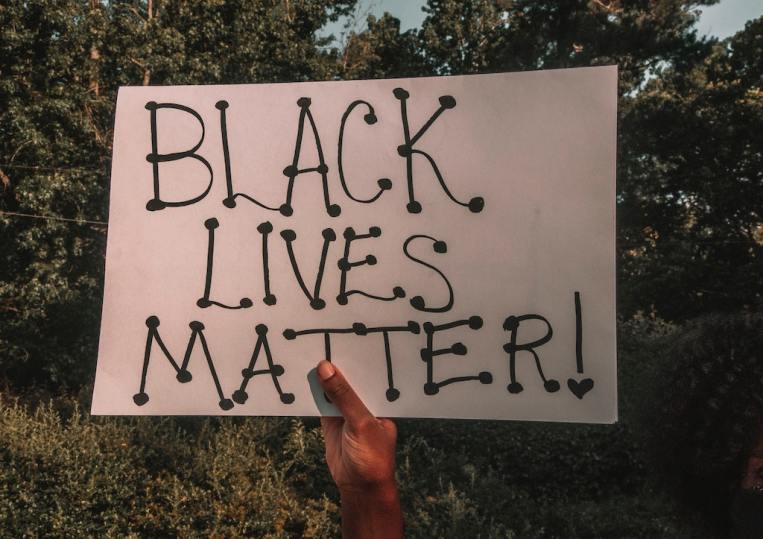 black-lives-matter-sign-hand.jpg