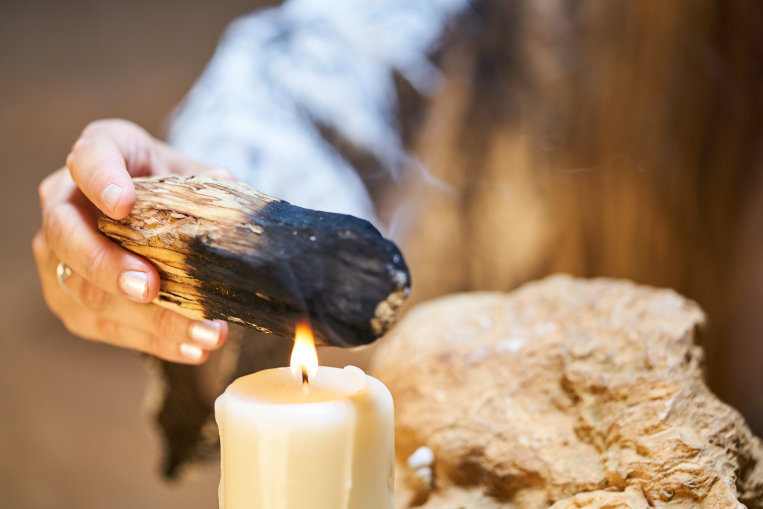 sacred-candle-burn-palo-santo.jpg