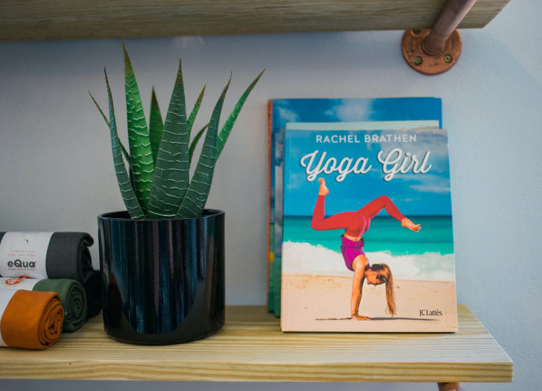 yoga-girl-book-shelf-plant.jpg