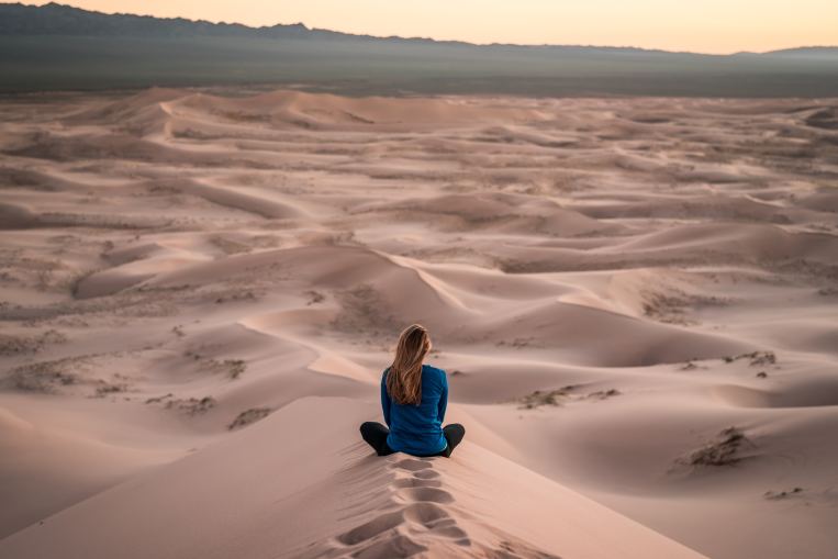 woman-desert-meditation-dune-sand.jpg