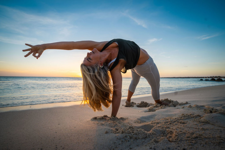 coral-brown-wildthing-backbend-heart-beach.jpg