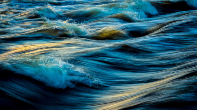 water-waves-blue-yellow-blur.jpg