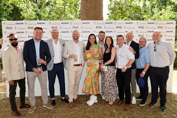 Group photo of the PXC Team at Channel Champions celebrating the win for People, HR and Culture Team of the Year