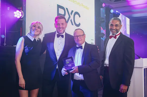 PXC team pictured with Maisie Adams at Comms Business Awards 2026