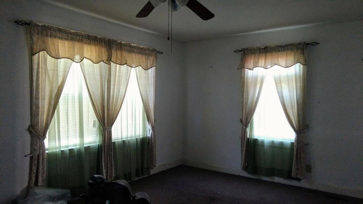 The windows don't let in much light, and the window treatments are outdated.