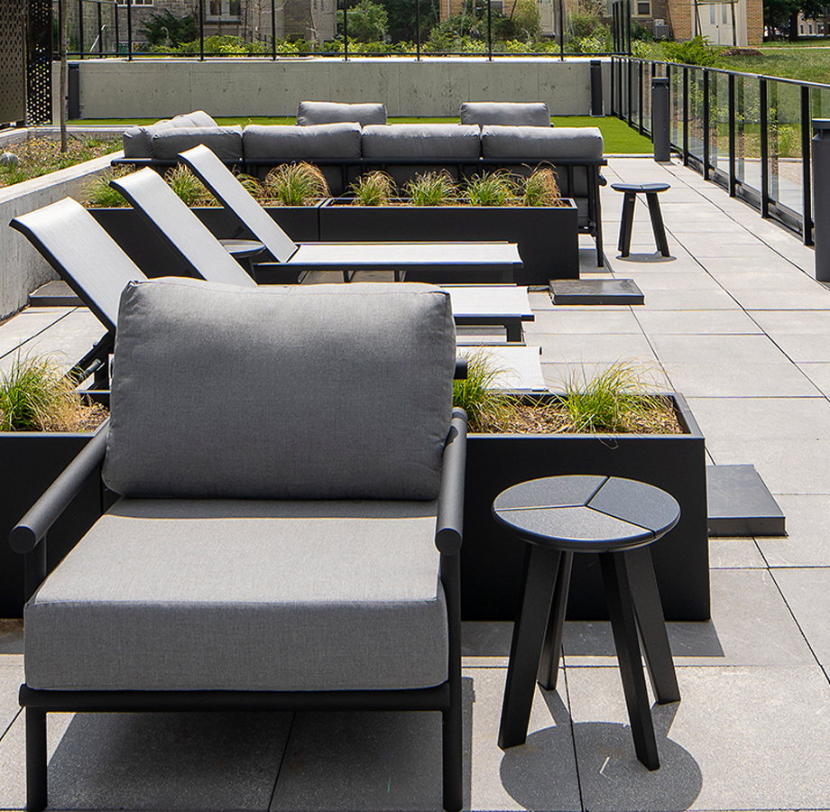 Private patio with dining area, built-in bbq, and lounge seating.