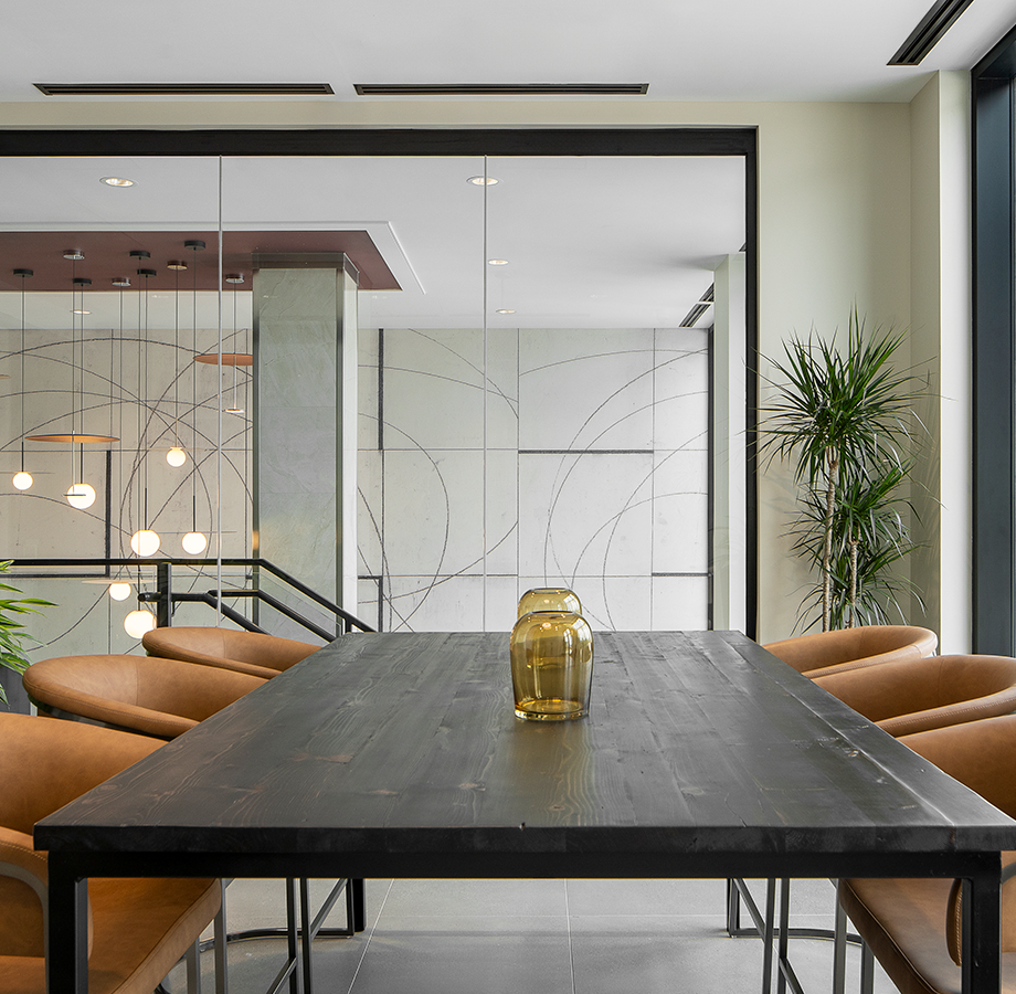 Upper lobby with shared working space with calming natural light. 