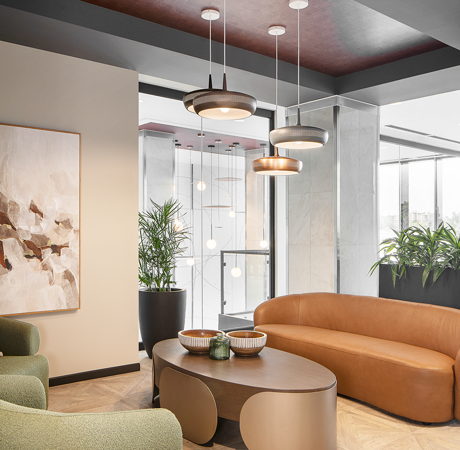 Elegant upper lobby lounge with cozy fireplace and sophisticated seating.