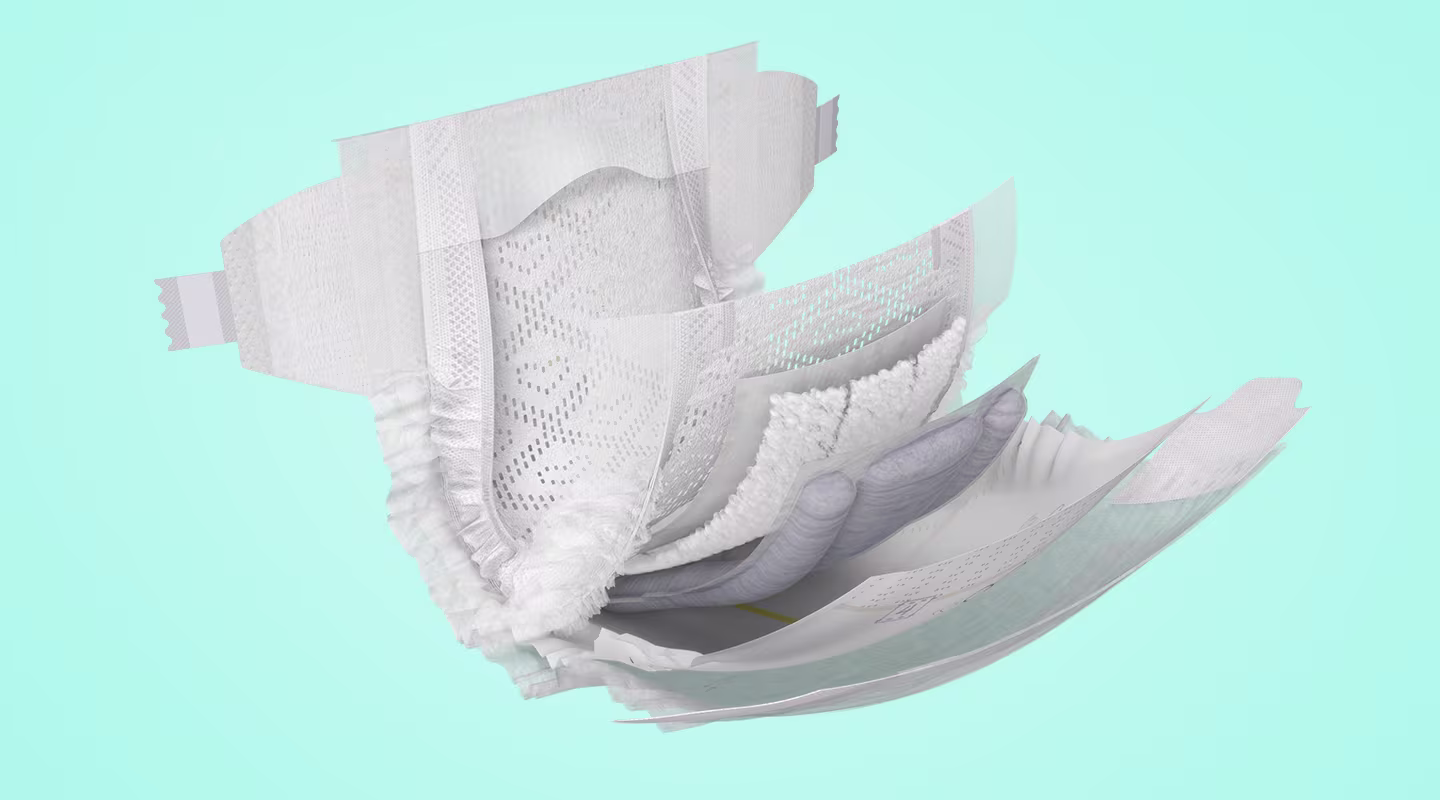 Open Pampers taped diaper showing the inside, with clickable points highlighting ingredients area.
