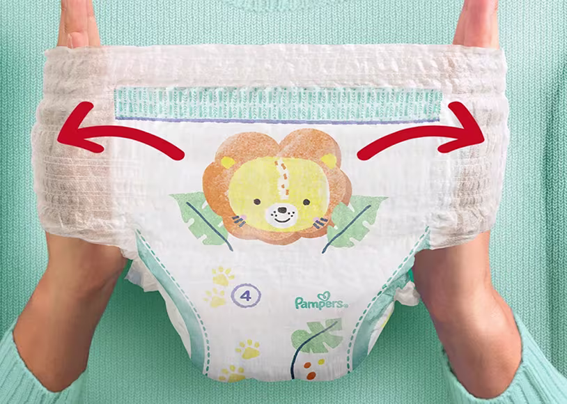 Pack of Pampers baby-dry nappy pants in a baby room Pack of Pampers baby-dry nappy pants in a baby room
