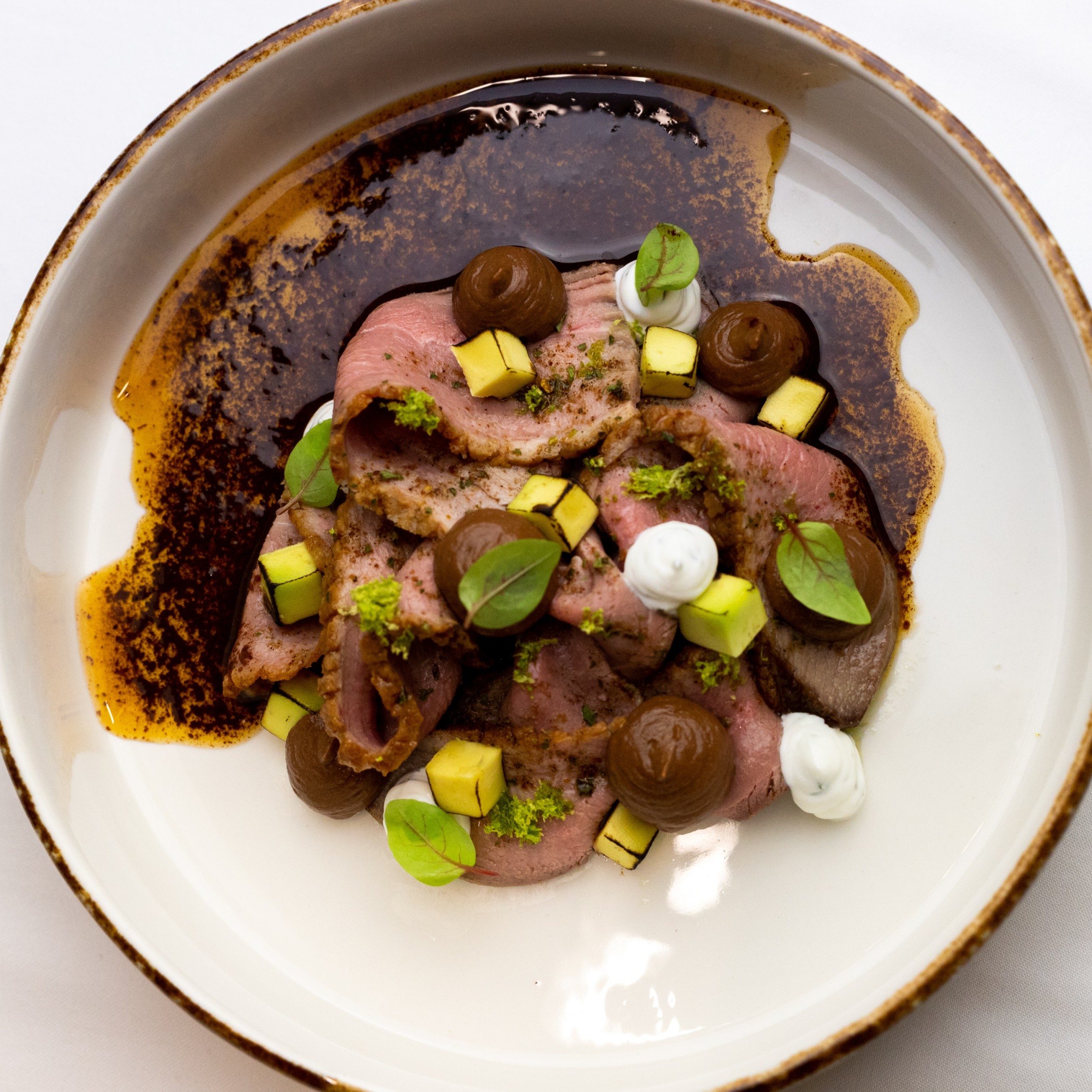 DeZaan Hero Image Of Duck Carpaccio