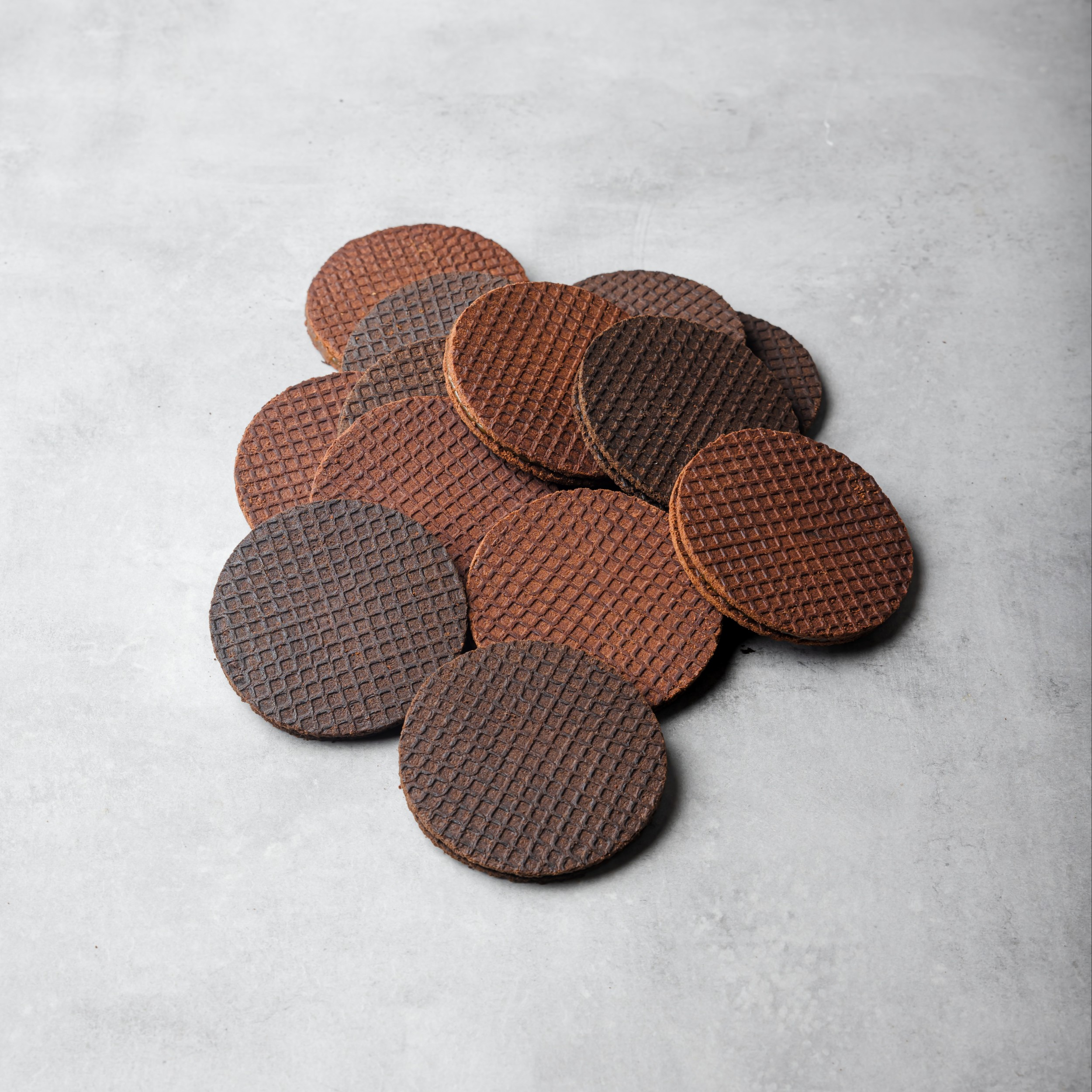 DeZaan Hero Image Of Rich Terracotta & Carbon Black Stroopwafels