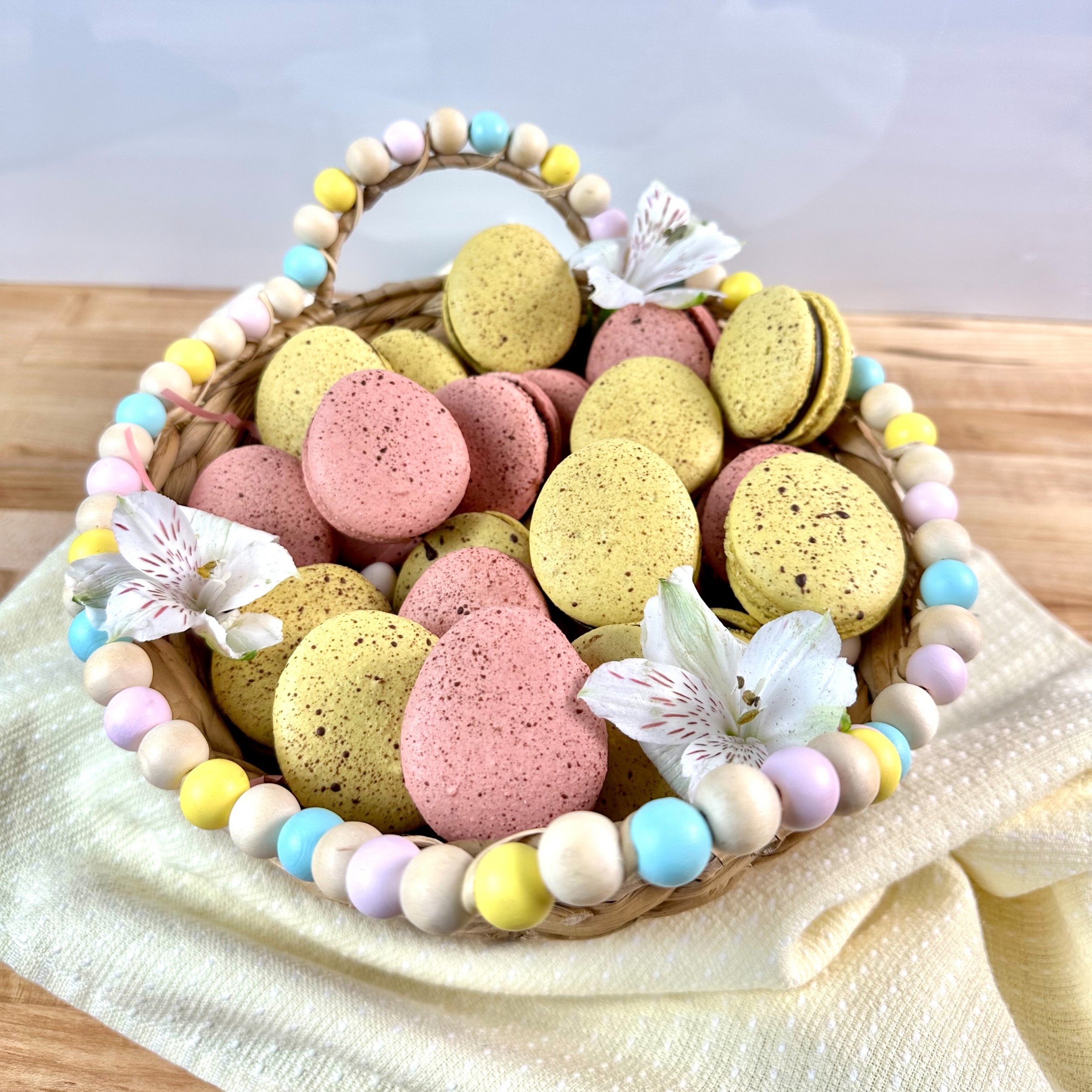 DeZaan Hero Image Of Macaron Easter Eggs