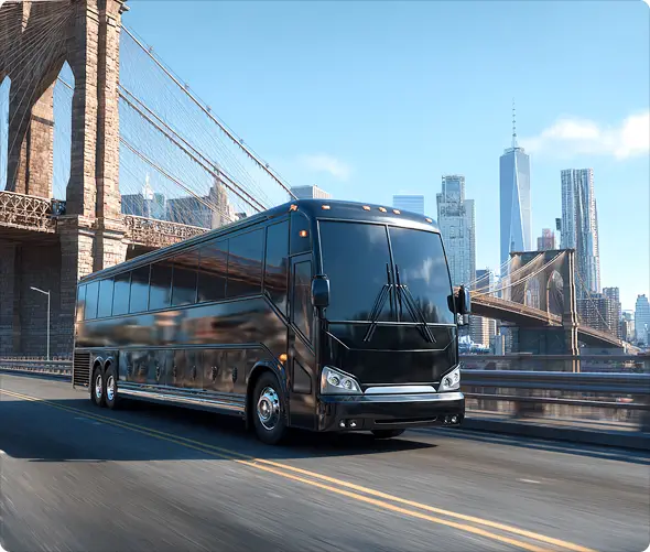 ## Discover New York with Bookinglane’s Charter Bus

Chartering a bus in New York gives your group the freedom to explore iconic destinations like Times Square, Central Park, the Empire State Building, Yankee Stadium, and Brooklyn Bridge Park without the usual transportation hassles. Our services are often used for corporate events, educational trips, trade shows, family reunions, and airport group pickups. Wherever you're headed, Bookinglane makes group travel across New York efficient, comfortable, and stress-free.

Our approach is built on reliability, personalization, and ease of use. Bookinglane’s platform simplifies the entire process—from choosing the right vehicle and submitting your itinerary to receiving real-time support and updates. By working with professional bus operators and chauffeur partners, we ensure every journey reflects the high standards our clients expect.