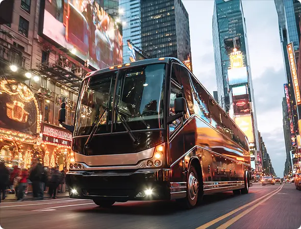 ## Comfortable Charter Bus Rentals in New York

New York City is a global icon—buzzing with business, culture, and nonstop energy. Whether you're planning a corporate retreat, student field trip, concert, or private group outing, getting around the city shouldn't be stressful. That’s where Bookinglane comes in.

Through our trusted network of top-rated charter bus and chauffeur partners, Bookinglane connects you with premium transportation solutions tailored to your group’s size, schedule, and needs. Whether you're navigating Manhattan’s fast pace or exploring the outer boroughs, you'll enjoy a smooth, reliable experience—complete with a professional driver and all the comforts you’d expect from luxury ground transportation.