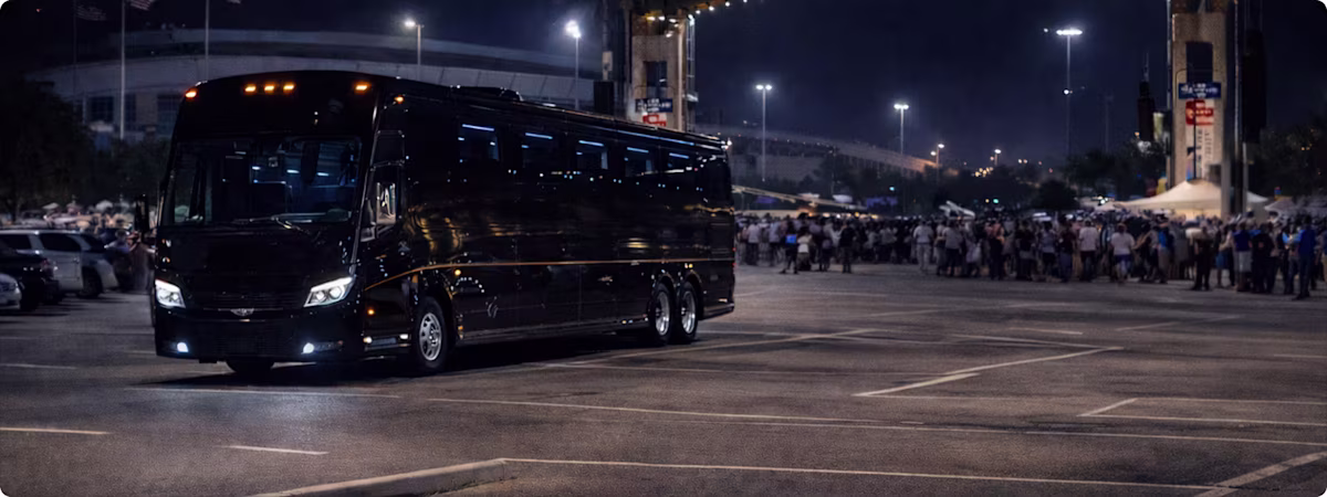 ## Charter Bus Transportation for Houston Livestock Show & Rodeo 2026 – Group Travel Made Easy
Bookinglane’s Charter Bus Service for the Houston Livestock Show & Rodeo provides a reliable transportation solution for large groups attending events at NRG Park. Our charter bus options include mini coaches for up to 28 passengers, mid-sized motorcoaches accommodating up to 35 passengers, and full-size executive coaches seating up to 56 passengers. These vehicles are ideal for corporate outings, sponsors, school groups, hospitality teams, and large families traveling together to RodeoHouston.
Charter buses feature comfortable seating, climate control, overhead and undercarriage storage, and a smooth ride suited for high-traffic event days. Professional chauffeurs manage routing, traffic, and road closures around NRG Park, ensuring efficient arrivals and departures while minimizing wait times. Group transportation eliminates the need to coordinate multiple vehicles or rely on limited parking during rodeo and concert nights.
Charter bus service is available from across the Houston metro area, including Downtown Houston, River Oaks, The Galleria, Memorial, The Woodlands, Sugar Land, Katy, Pearland, Cypress, and Clear Lake, as well as airport transfers from George Bush Intercontinental Airport (IAH) and William P. Hobby Airport (HOU). With coordinated pickup locations and flexible scheduling, charter bus transportation offers a cost-effective and organized way to experience Houston Rodeo 2026.