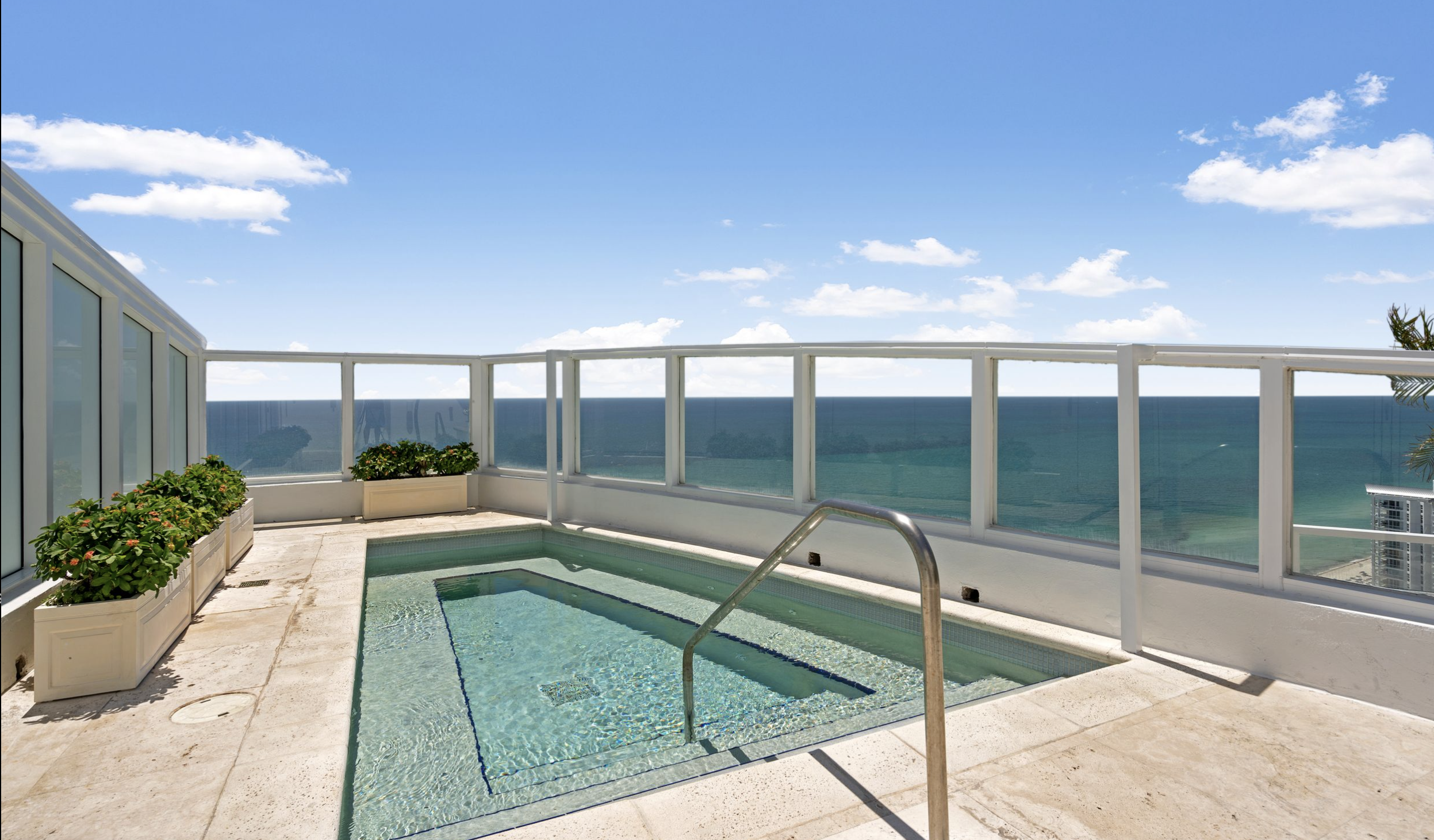 View of rooftop pool of Miami Beach adjacent penthouses