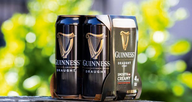 Neljän Guinness-oluttölkin pahvinen myyntipakkaus
