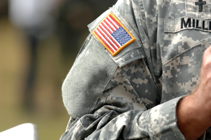 A cropped image of a U.S. soldier in uniform illustrates a story about the Servicemembers Civil Relief Act.