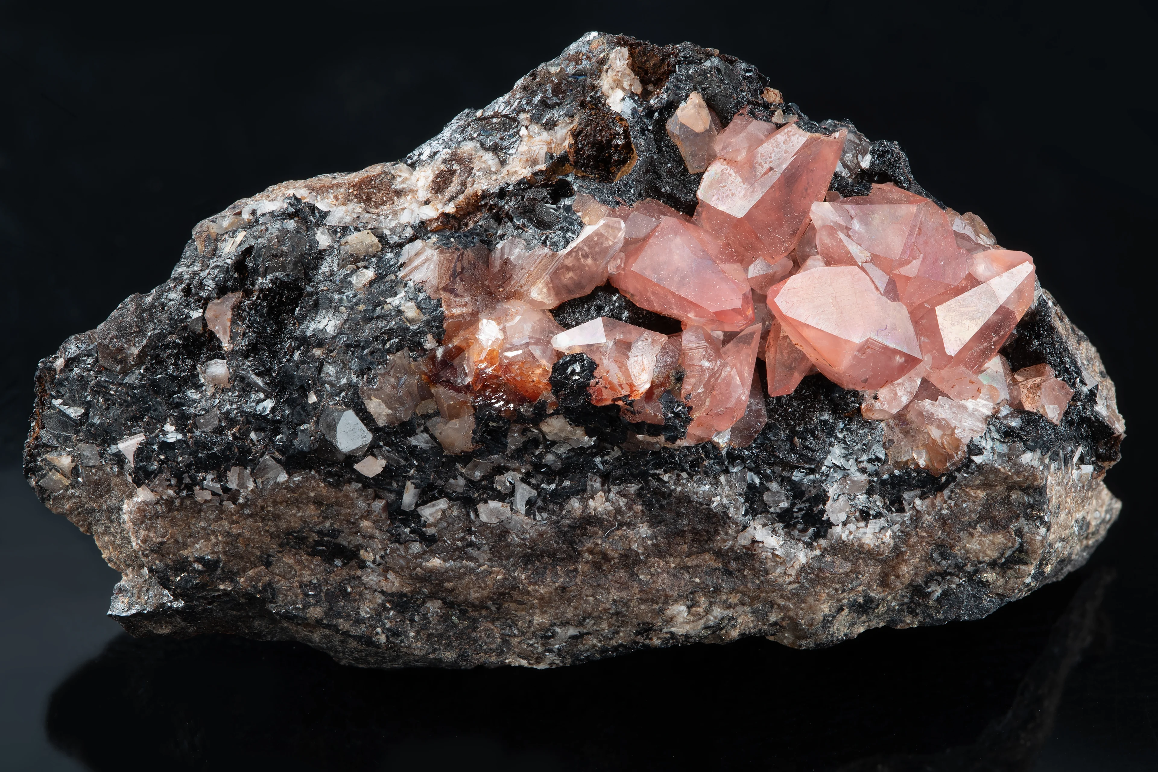 Rhodochrosite_on_Matrix_-_Peru.jpg