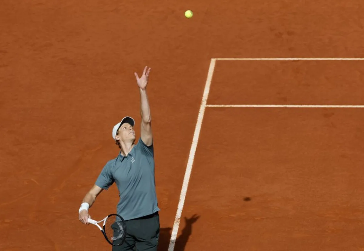 Italy's Jannik Sinner serves to Germany's Alexander Zverev during the 2026 ATP Tour Madrid Open tennis tournament final singles match at the Caja Magica in Madrid, on May 3, 2026.  Oscar DEL POZO / AFP