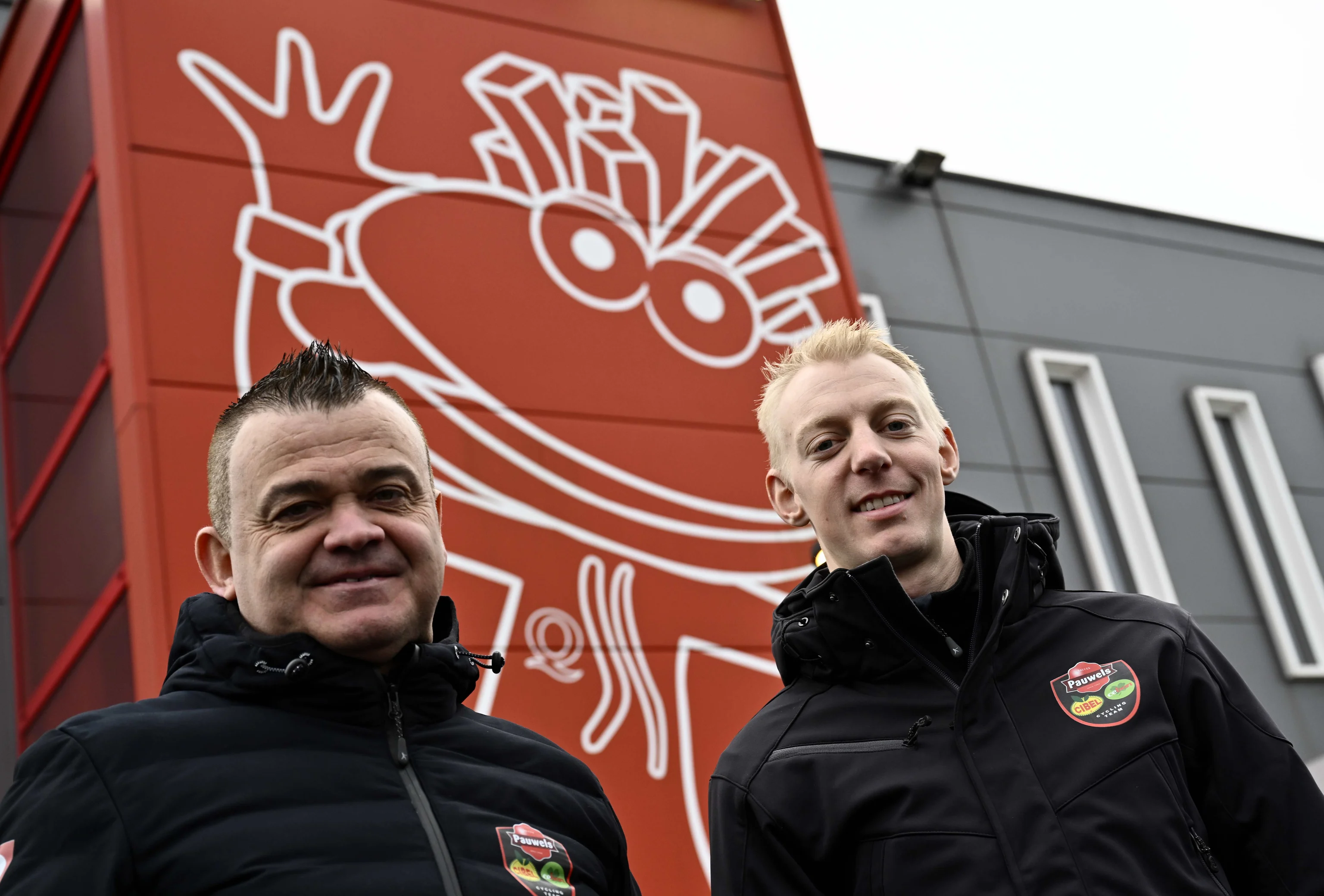 Pauwels Sauzen-Cibel team manager Jurgen Mettepenningen and Belgian Michael Vanthourenhout pose for photographer in marge of a press conference of Pauwels Sauzen - Cibel Clementines ahead of the Belgian championship (11-12/01), in Kuringen, on Wednesday 08 January 2025. BELGA PHOTO ERIC LALMAND