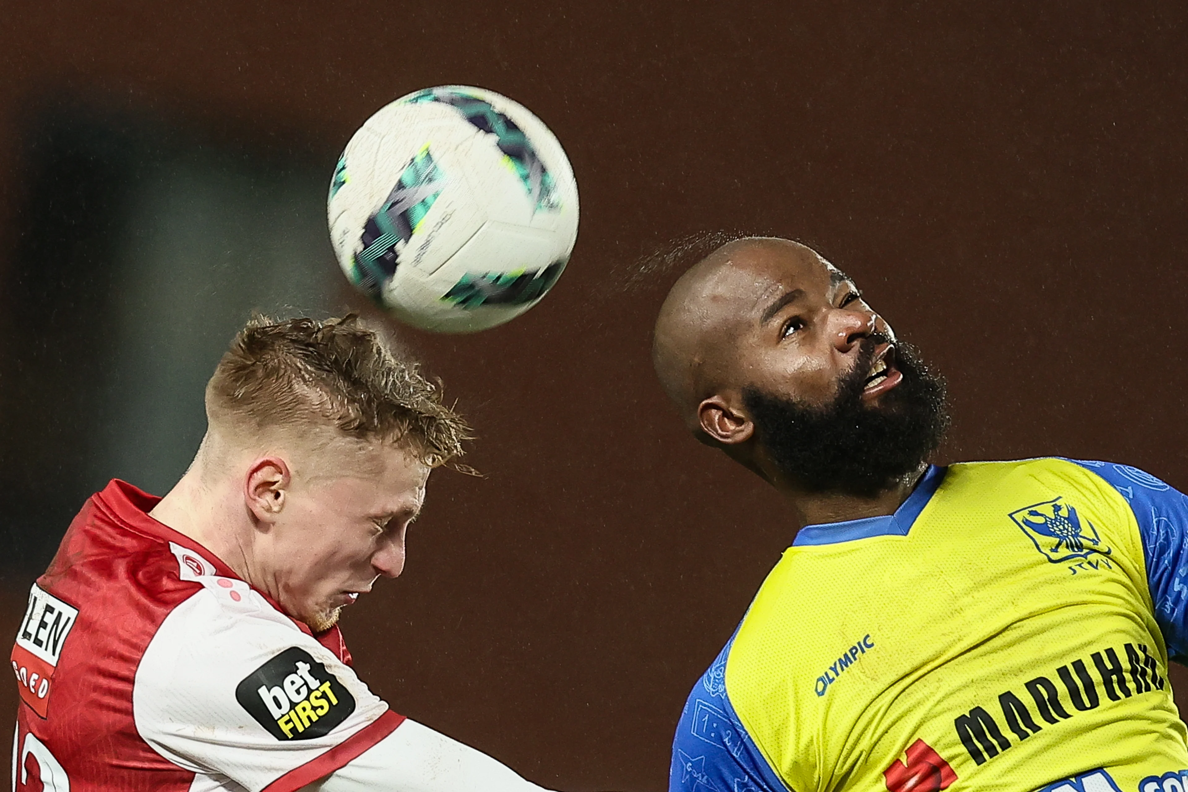 Antwerp's Zeno Van Den Bosch and STVV's Didier Lamkel Ze fight for the ball during a soccer match between Sint-Truidense VV and Royal Antwerp FC, Friday 24 January 2025 in Sint-Truiden, on day 23 of the 2024-2025 season of the 'Jupiler Pro League' first division of the Belgian championship. BELGA PHOTO BRUNO FAHY