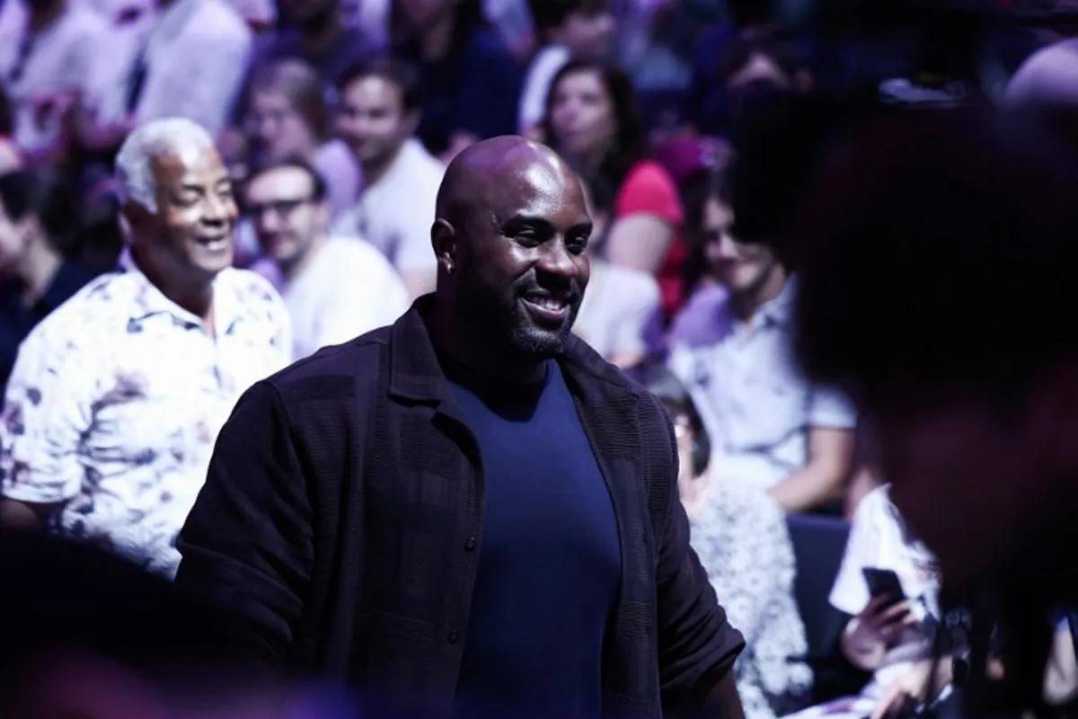 French judoka Teddy Riner smiles on day 2 of the 2026 Paris Sumo Tournament, in Paris on June 14, 2026. Behrouz MEHRI / AFP