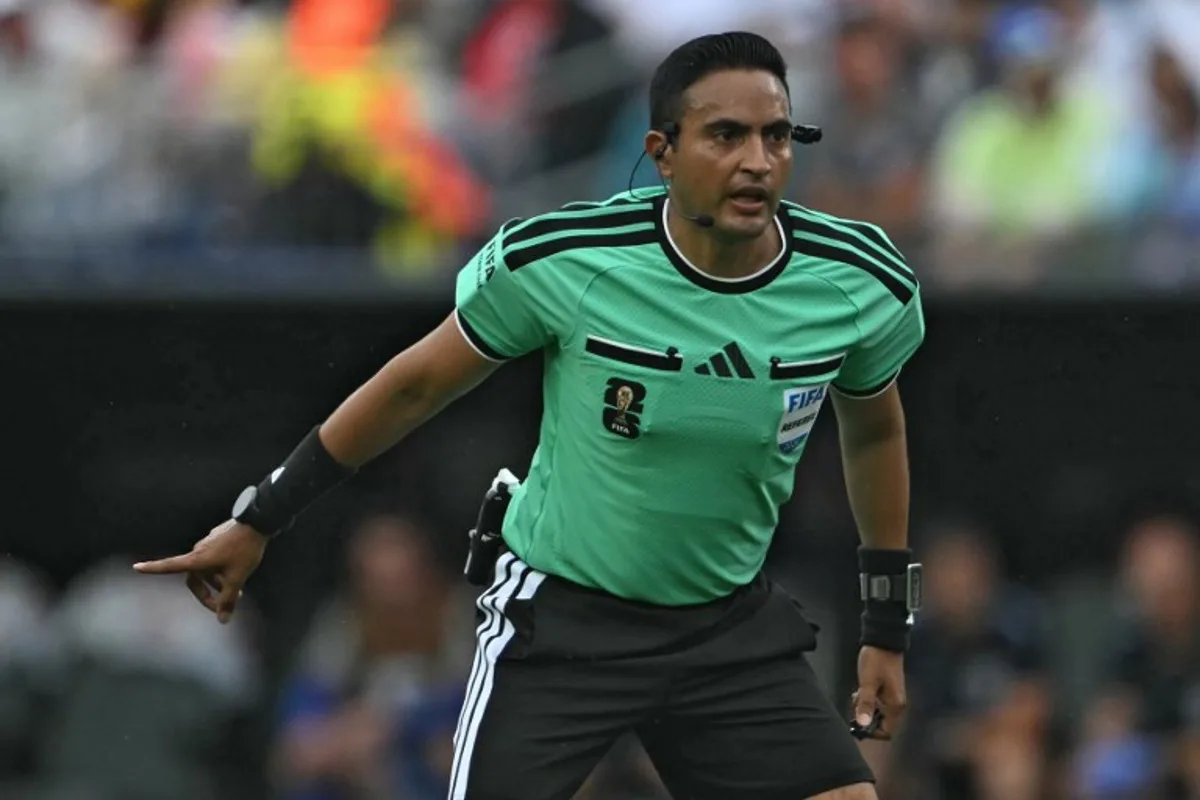 Honduran referee Said Martinez gestures a ruling  during the 2026 World Cup Group L football match between England and Ghana at the Boston Stadium in Foxborough on June 23, 2026.   MAURO PIMENTEL / AFP