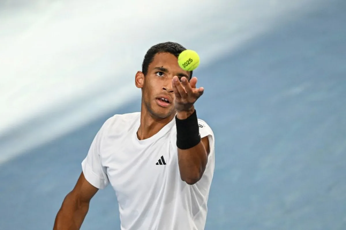 Canada's Felix Auger-Aliassime serves during his men's singles final match against USA's Sebastian Korda at the Adelaide International tennis tournament in Adelaide on January 11, 2025.   Michael ERREY / AFP