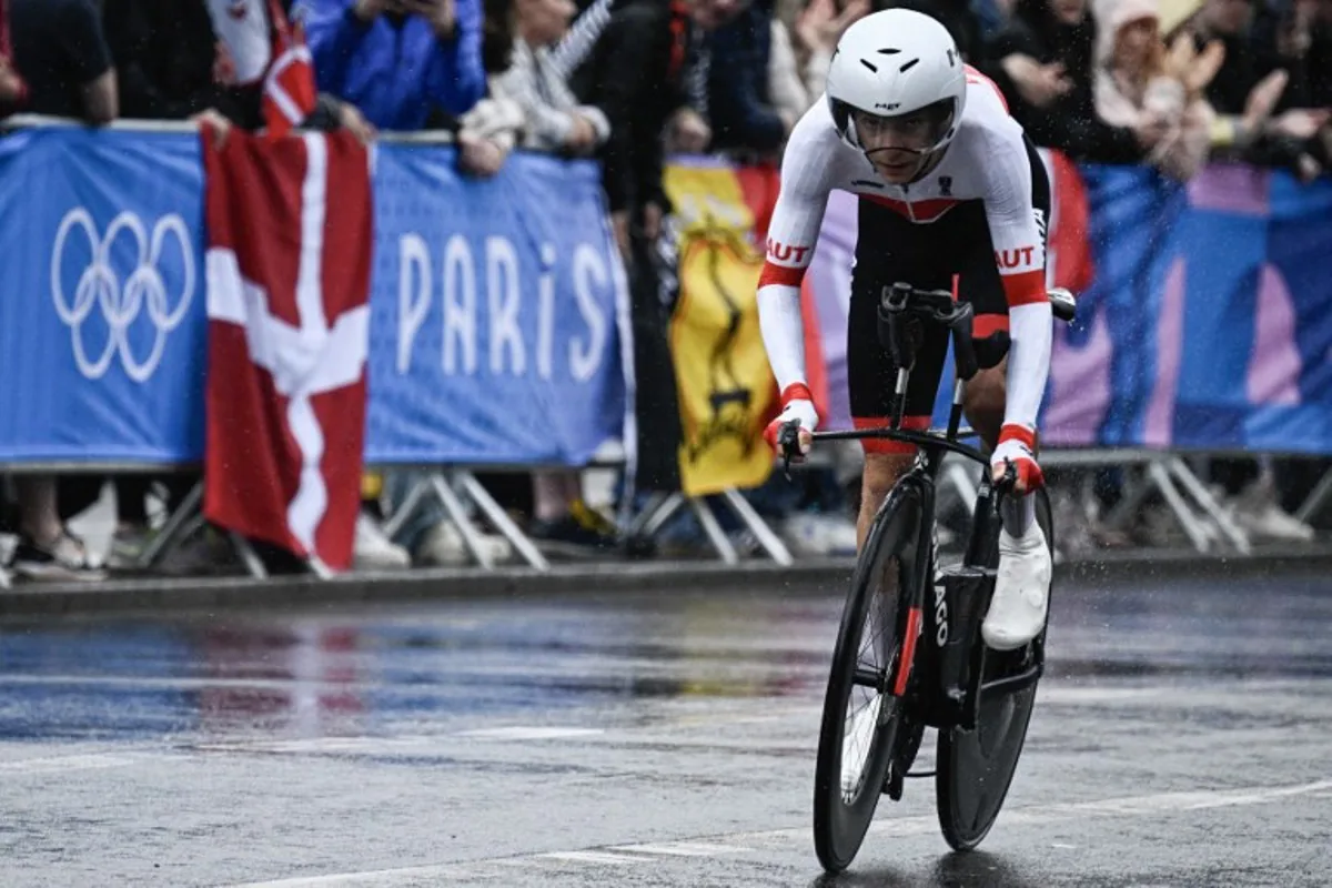 Austria's Felix Grossschartner cycles as he competes in the men's road cycling individual time trial during the Paris 2024 Olympic Games in Paris, on July 27, 2024. JULIEN DE ROSA / AFP