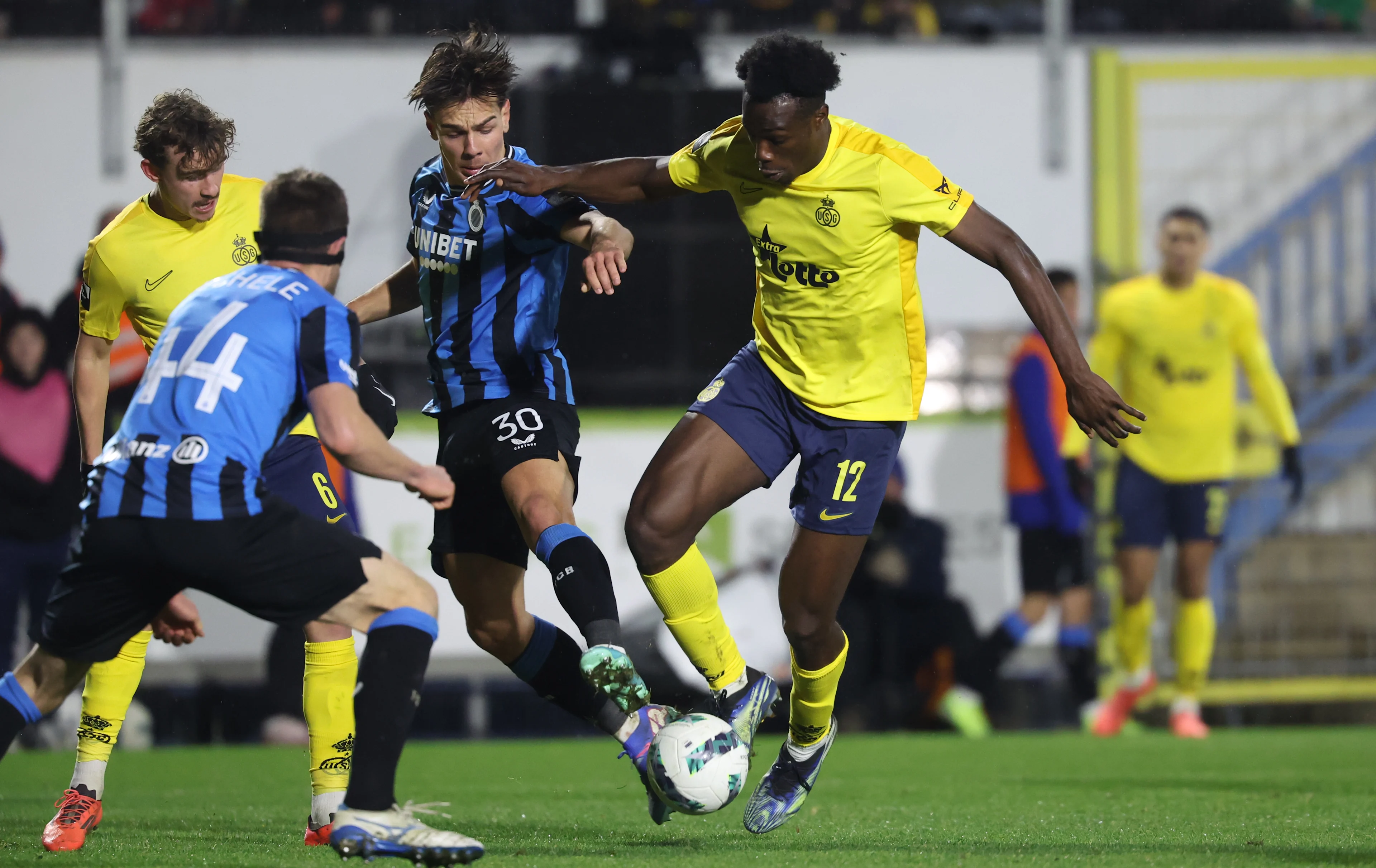 Club's Ardon Jashari and Union's Promise David fight for the ball during a soccer match between Royale Union Saint-Gilloise and Club Brugge, Sunday 22 December 2024 in Brussels, on day 19 of the 2024-2025 season of the 'Jupiler Pro League' first division of the Belgian championship. BELGA PHOTO VIRGINIE LEFOUR