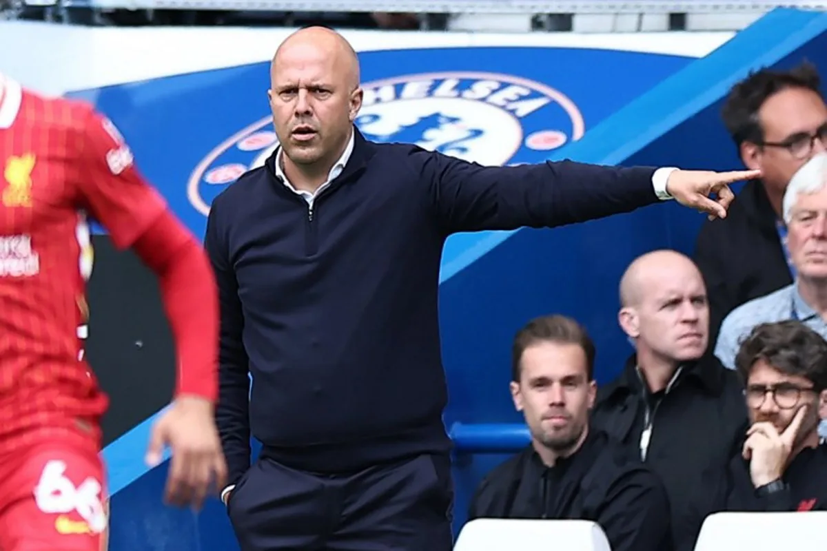 Liverpool's Dutch manager Arne Slot gestures on the touchline during the English Premier League football match between Chelsea and Liverpool at Stamford Bridge in London on May 4, 2025. HENRY NICHOLLS / AFP