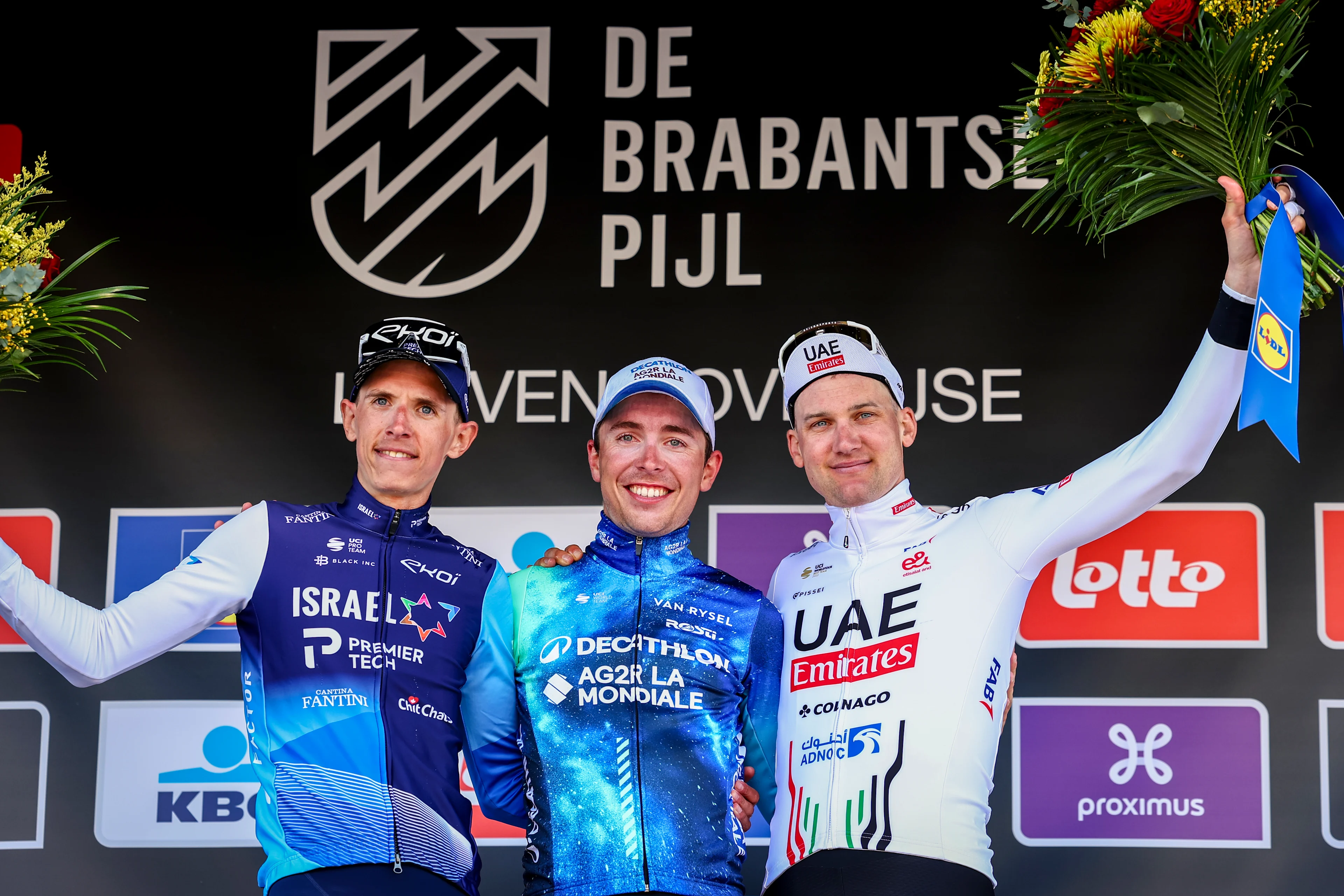 Belgian Dylan Teuns of Israel-Premier Tech, French Benoit Cosnefroy of Decathlon Ag2r La Mondiale Team and Belgian Tim Wellens of UAE Team Emirates pictured on the podium after the men's 'Brabantse Pijl' one day cycling race, 195,2 km from Leuven to Overijse on Wednesday 10 April 2024. BELGA PHOTO DAVID PINTENS