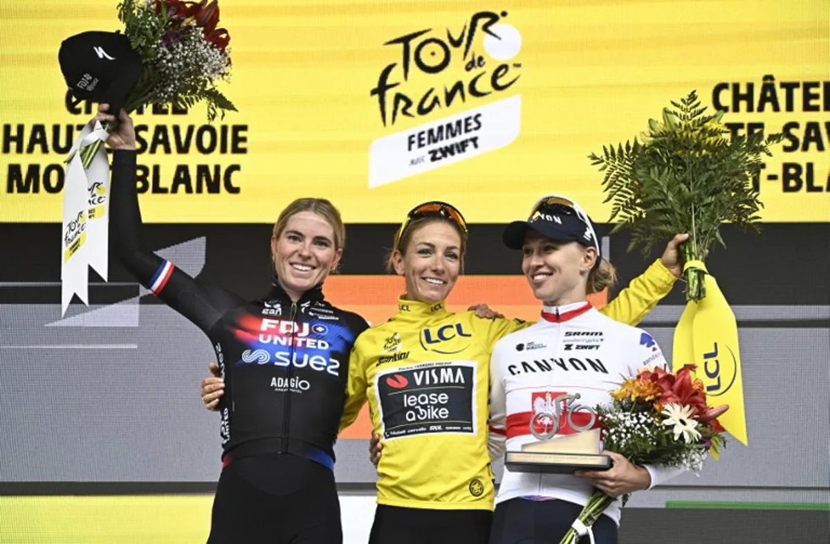 (From L) Second-placed FDJ-SUEZ team's Dutch rider Demi Vollering, overall winner Team Visma | Lease a Bike's French rider Pauline Ferrand-Prevot and third-placed Canyon//SRAM Racing team's Polish rider Katarzyna Niewiadoma celebrate on the podium after the 9th and last stage of the fourth edition of the Women's Tour de France cycling race at the end of the 9th and final stage (out of 9) 124.1 km from Praz-sur-Arly to Chatel, in Chatel, eastern France on August 3, 2025. JULIEN DE ROSA / AFP