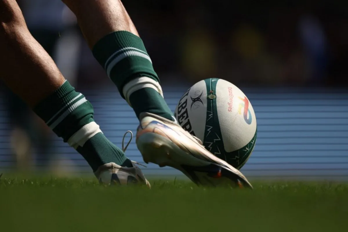 A player kicks the ball during the French Top 14 rugby union match between ASM Clermont Auvergne and Section Paloise Bearn Pyrenees (Pau) at the Marcel Michelin stadium in Clermont-Ferrand, central France on September 20, 2025. Alex MARTIN / AFP